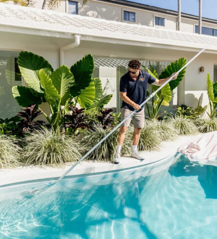 Pool technician providing professional pool cleaning at a Keilor home