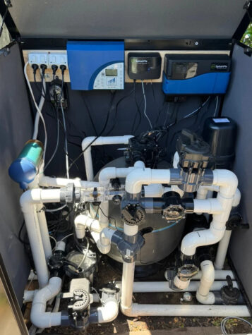 SplashMe pool automation system installed with pool equipment